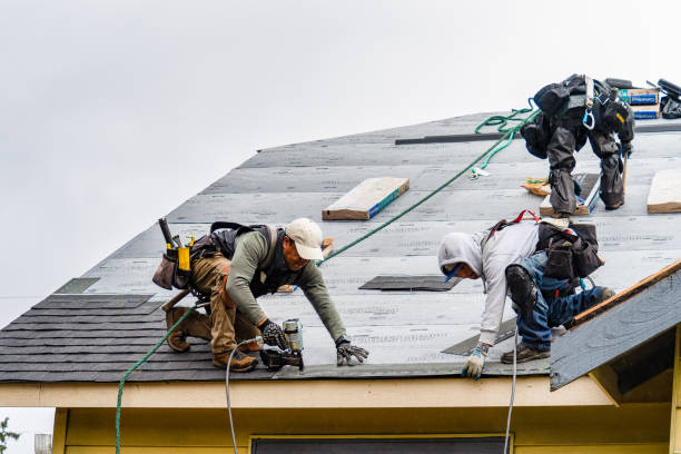 Professional Gutter Installation technician working in Brighton, MI